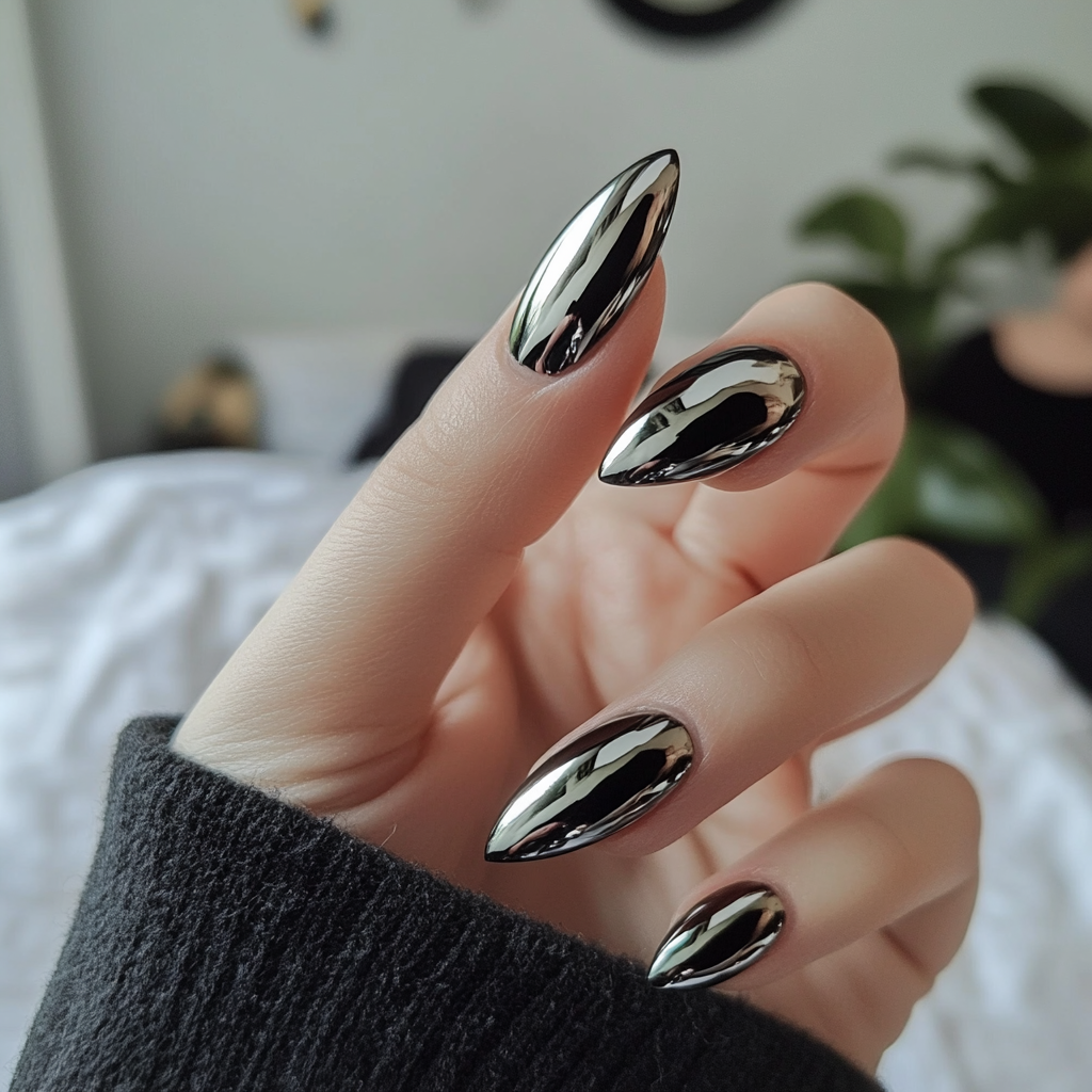 Candid white woman shows off round black nails.