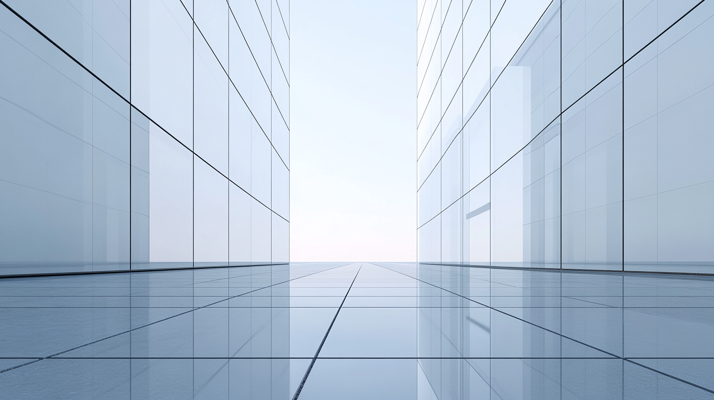 Glossy white building with high lobby at dawn