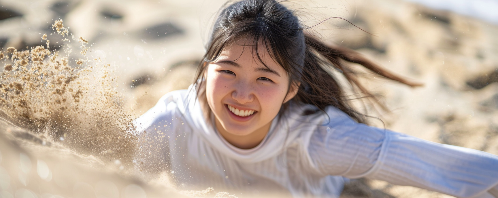 Japanese Teen Playing in Sand, Smiling Portrait Photo