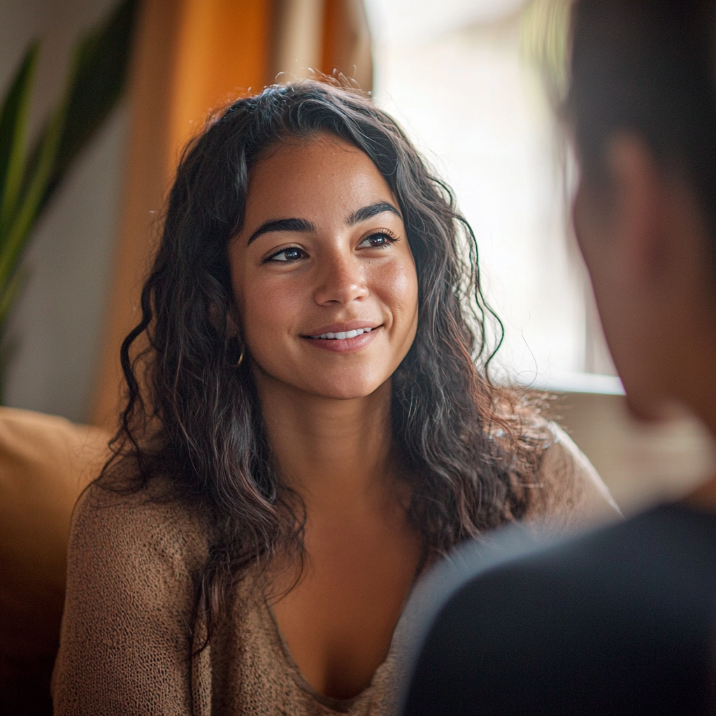 Latina Woman Speaking with Mother in Warm Setting