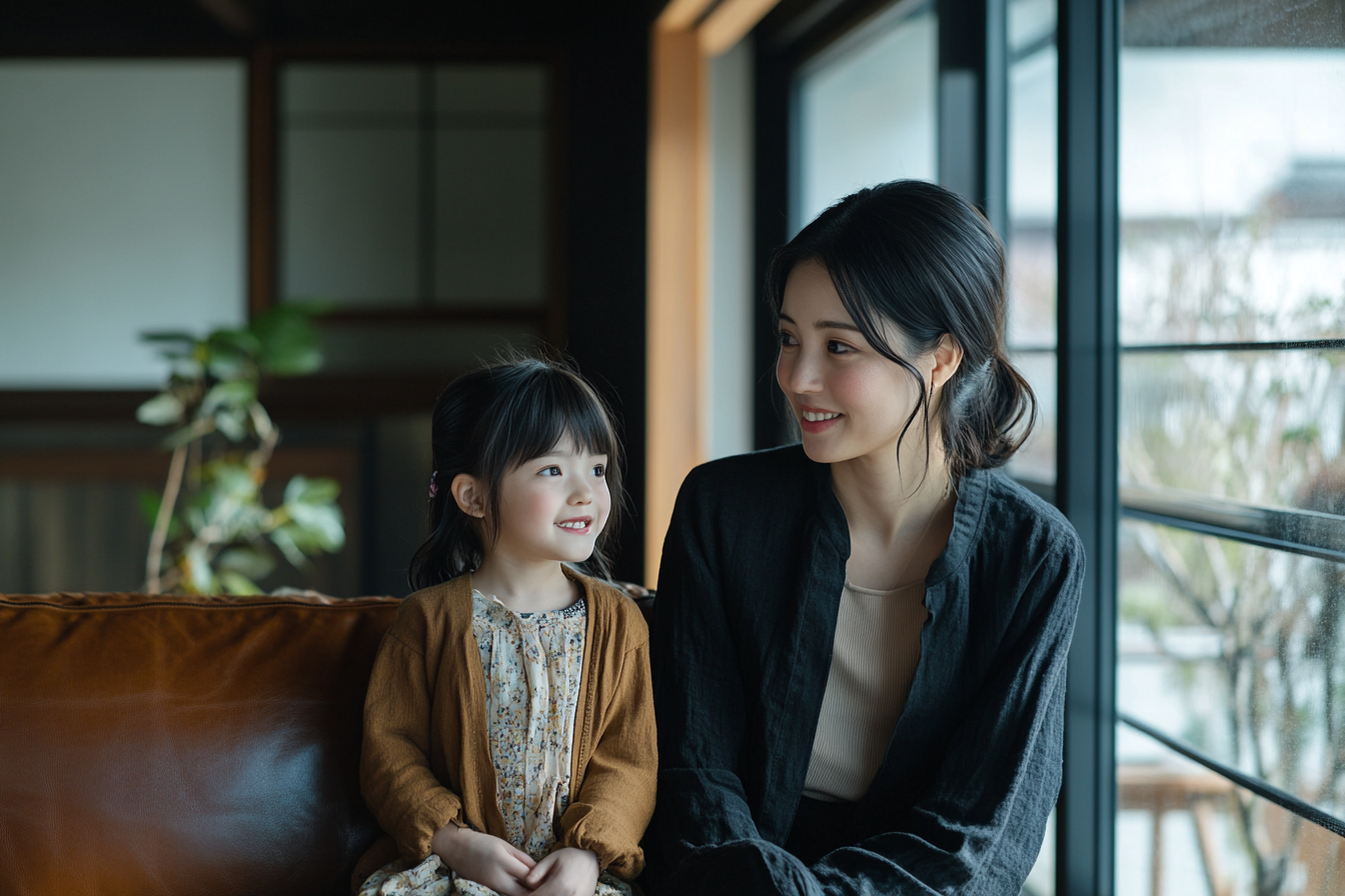 Mother and daughter sharing a cozy family moment.