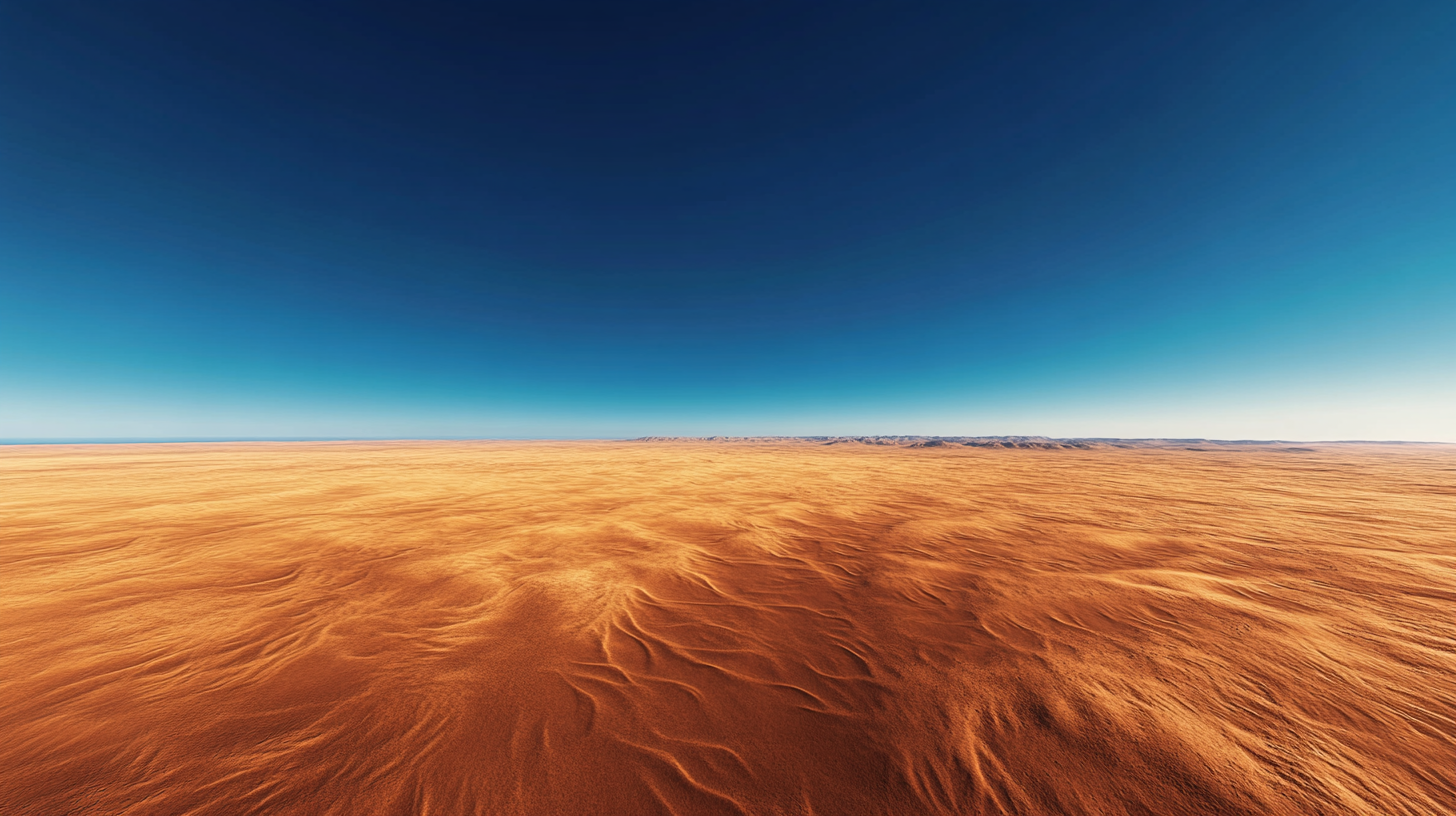 Vivid desert landscape with blue sky, red sands, shadows