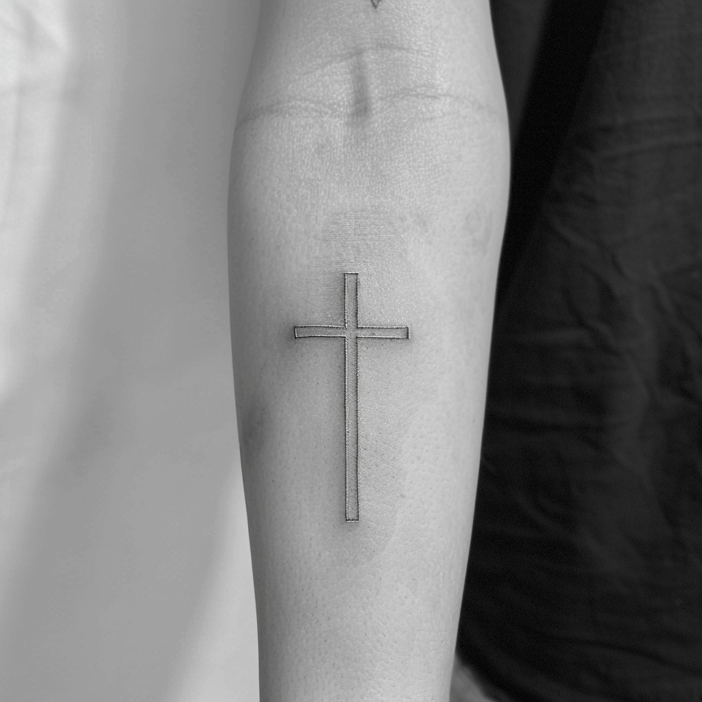 simple black grey cross tattoo