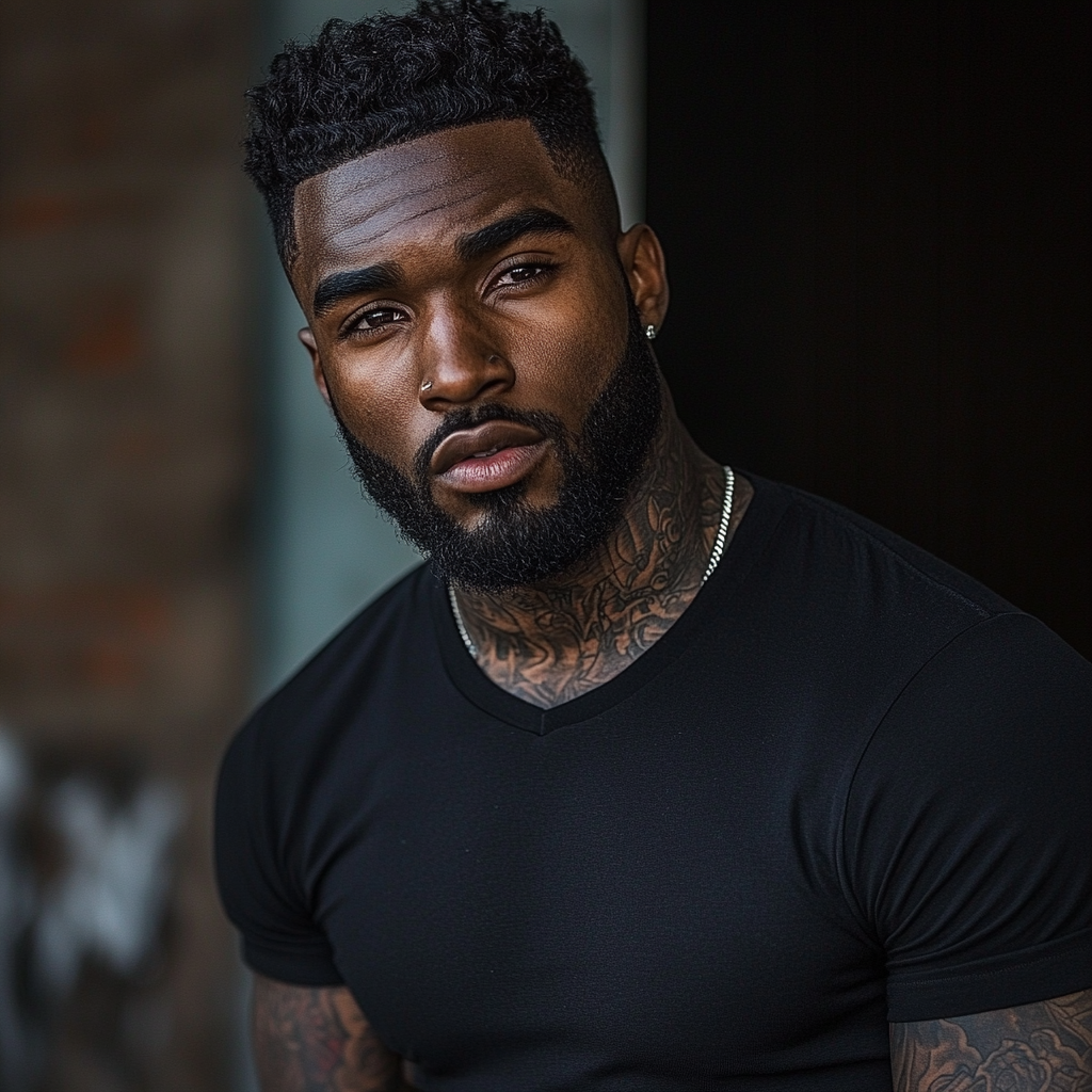 Tall athletic black man with tattoos