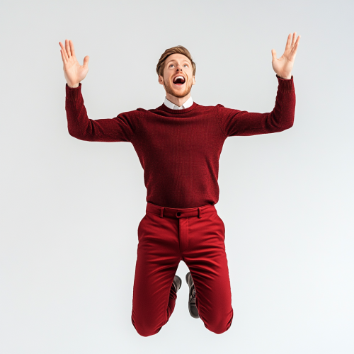 25-year-old man in red outfit looks excited.