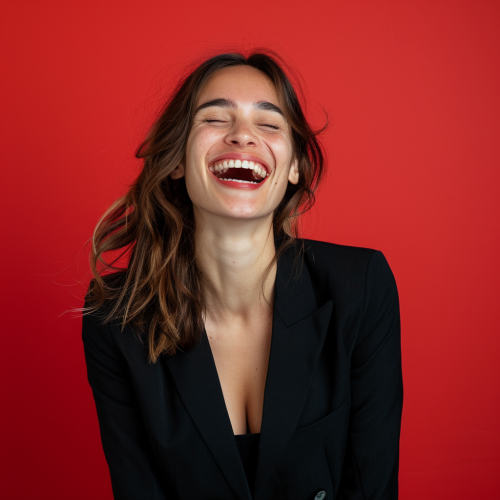 A Business Woman Smiling in a Studio Photo