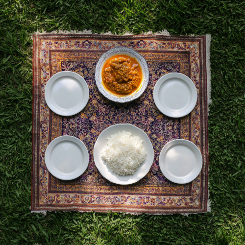 A Realistic Iranian Lunch Table on Green Lawn