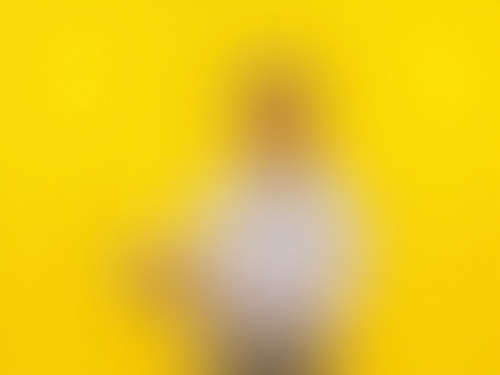 A Sales Rep Presenting Product on Yellow Background