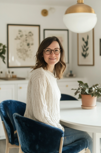 A Woman in Kitchen Dining Area Smiling Happily.