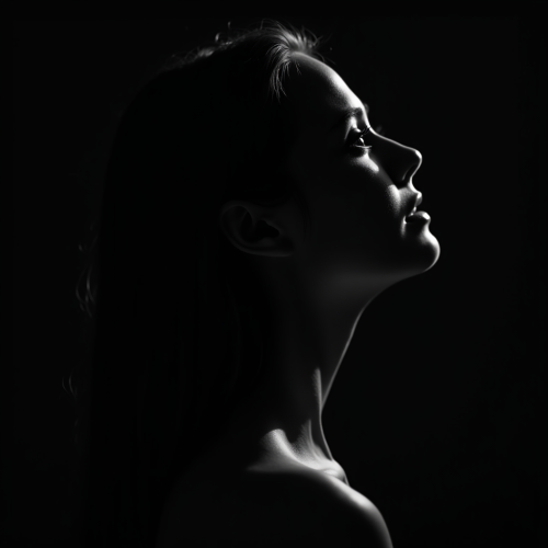 A Young Woman's Silhouette in Dramatic Lighting