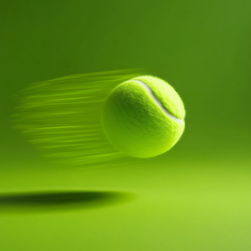 A fast tennis ball against lime green background