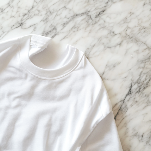A marble table with t-shirt in soft light