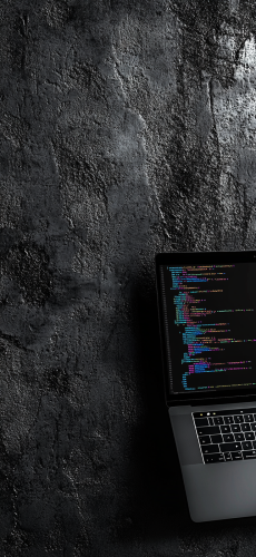 A stylish laptop showing code snippets on screen
