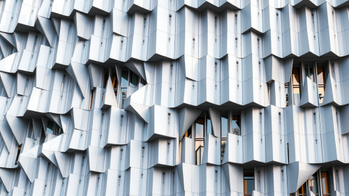 Adjustable building cover moves with weather patterns.