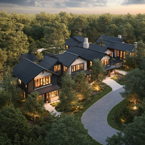Cinematic Aerial View of Multiunit Farmhouse with Beautiful Landscaping