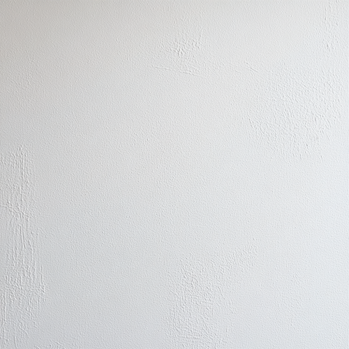 Close-up view of blank white wall for wallpaper design.