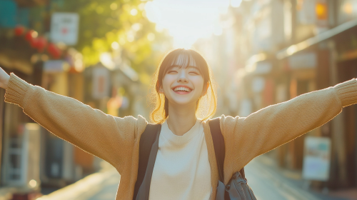 Excited Japanese student in Nagasaki, smiling on street.