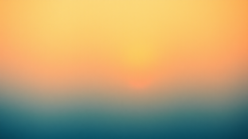 Gradient of warm oranges and cool blues background. Vintage feel.