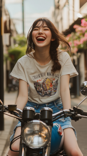 Joyful Japanese Woman on Blue Motorcycle in Flower Alley