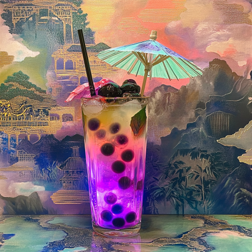 Lava lamp cocktail with boba in shooters glass
