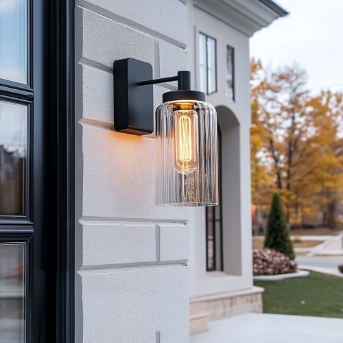 Modern black outdoor wall lights in night ambiance.