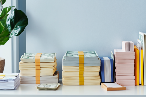 Neat stacks of money on desk in 8K