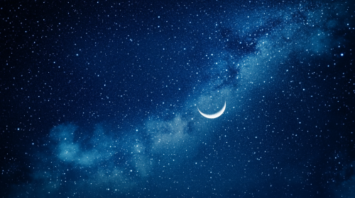 Night sky full of stars, Milky Way, crescent moon.