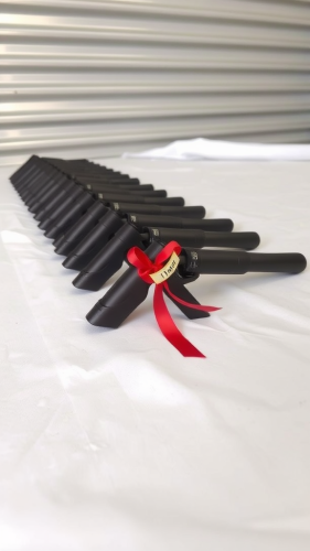 Nozzles on White Cloth with Special May 1st Ribbon