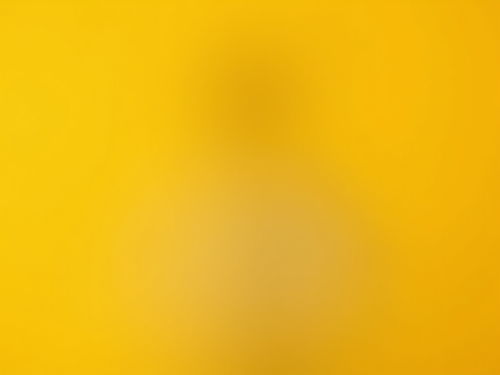 Sales Rep Showcasing Product on Yellow Background