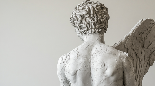 White ceramic Greek statue man in a museum