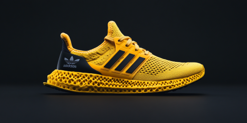 Yellow Adidas shoe on clean black background, modern design