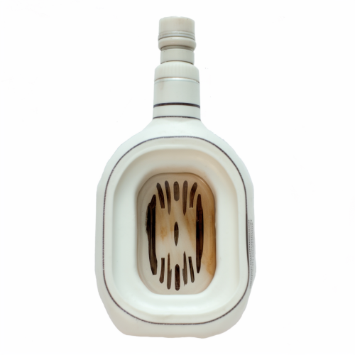 Beige dietary supplement capsule on white background