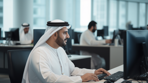 Dubai government employees working in office Dubai government employees working in office