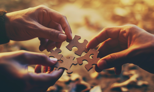 Two puzzle pieces about to match