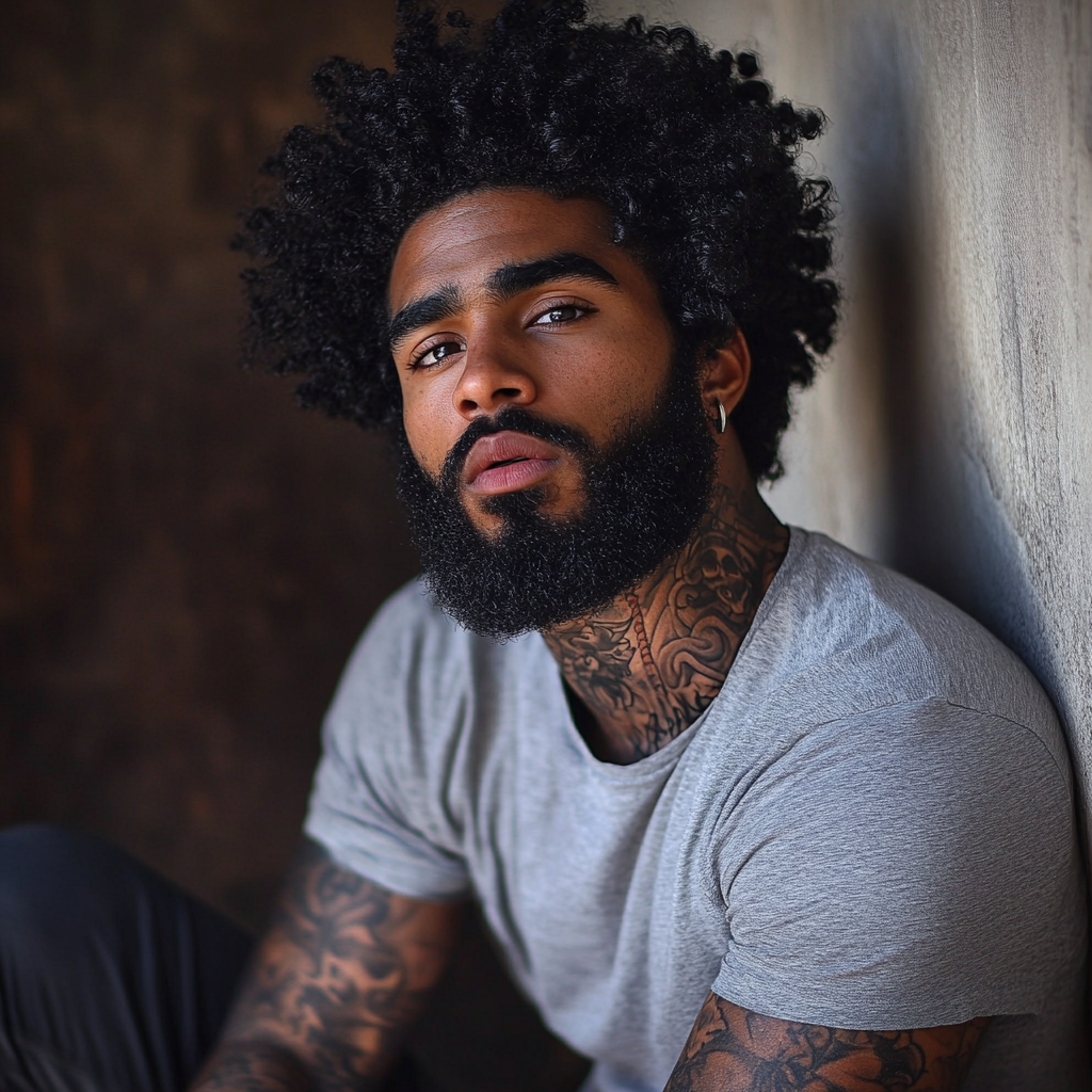 Athletic Black Man with Tattoos and Afro