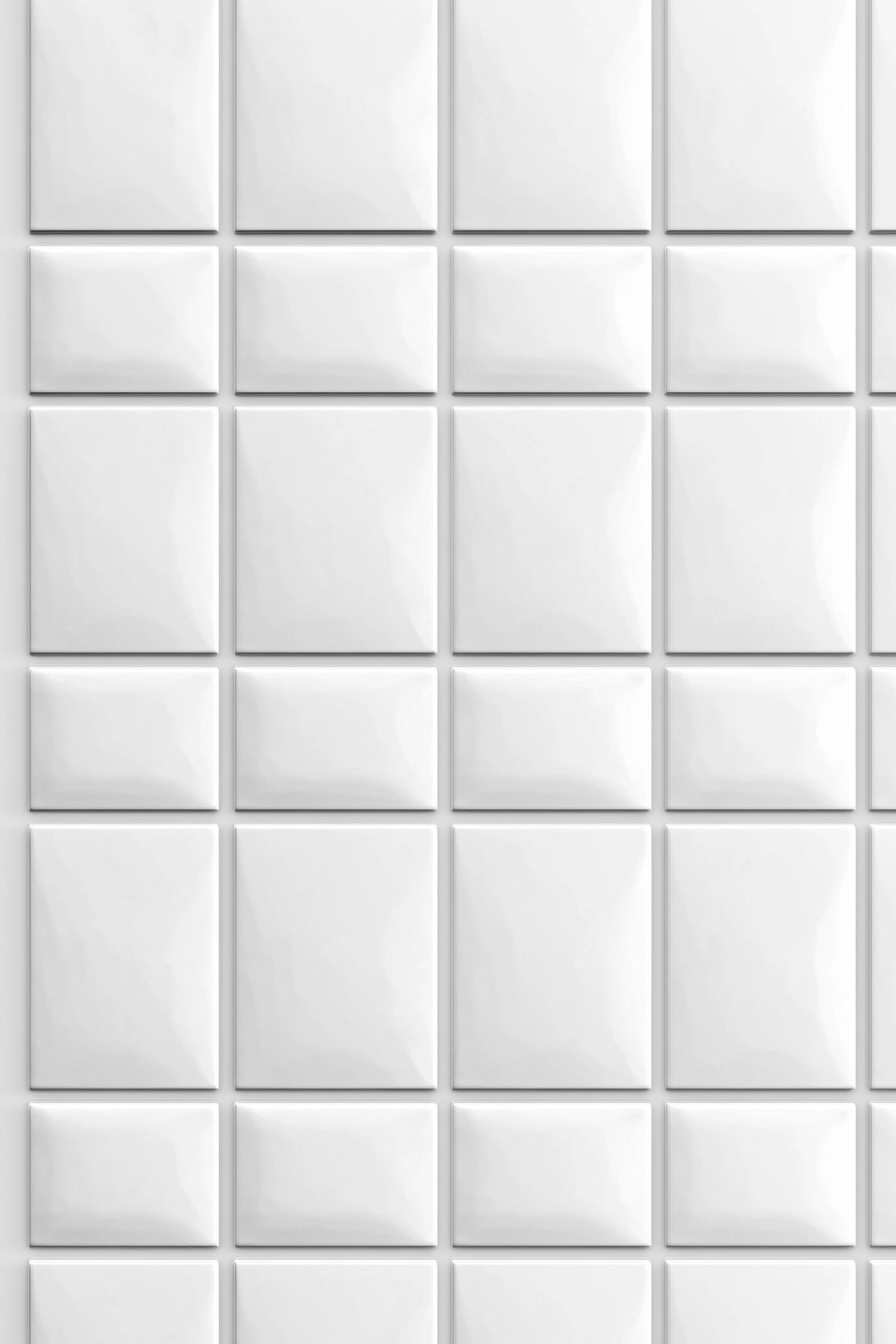 Bright white square tile wall background details focus