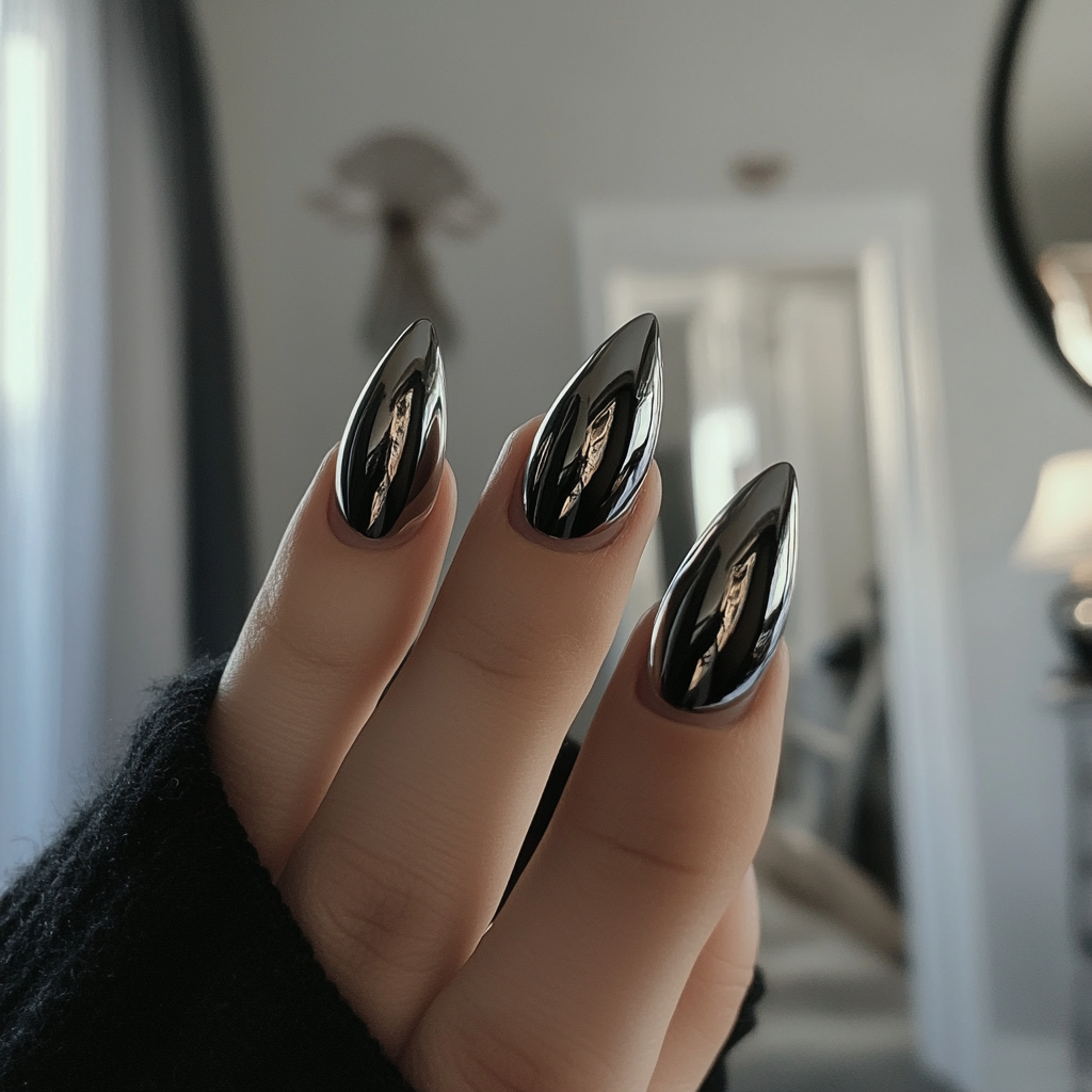 Candid white woman shows off round black nails.