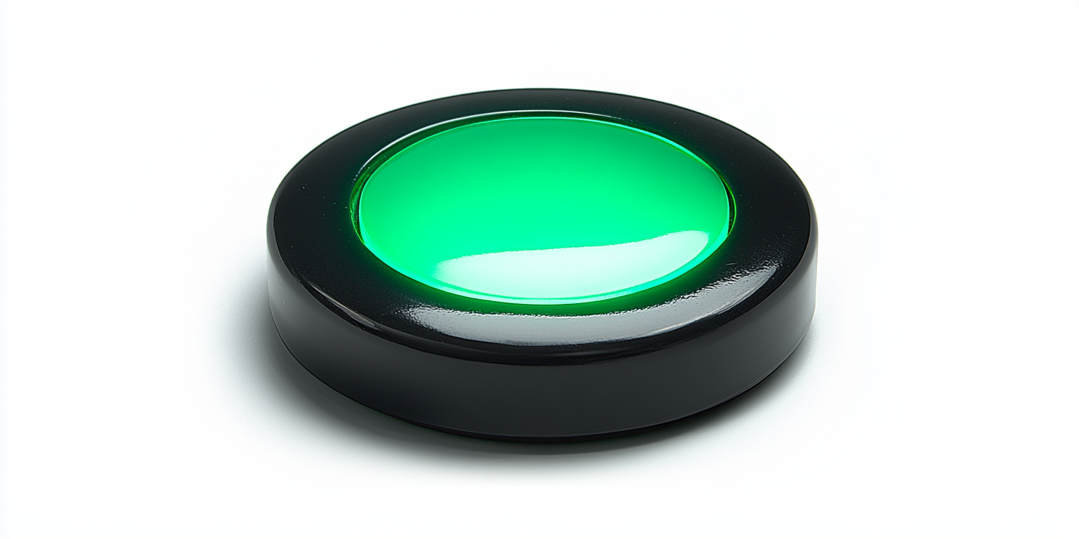 Green glowing button on black base, angled left.