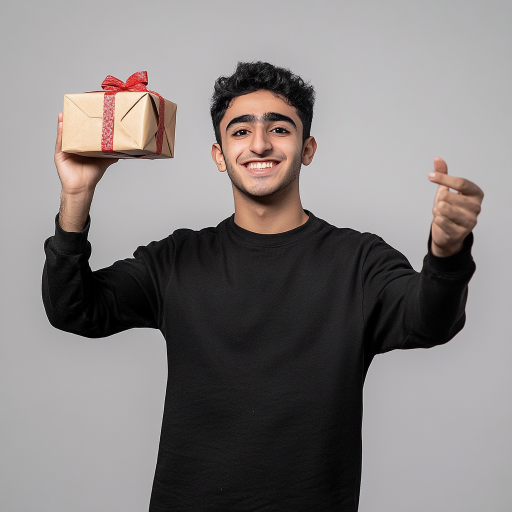 Happy young Arab man raising mystery gift