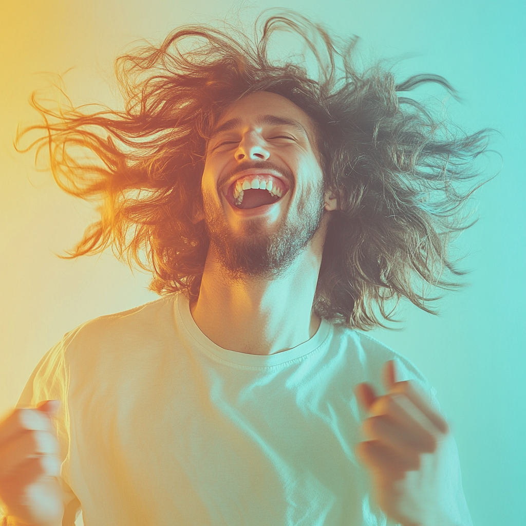 Man celebrating, running hands through healthy, shiny hair.