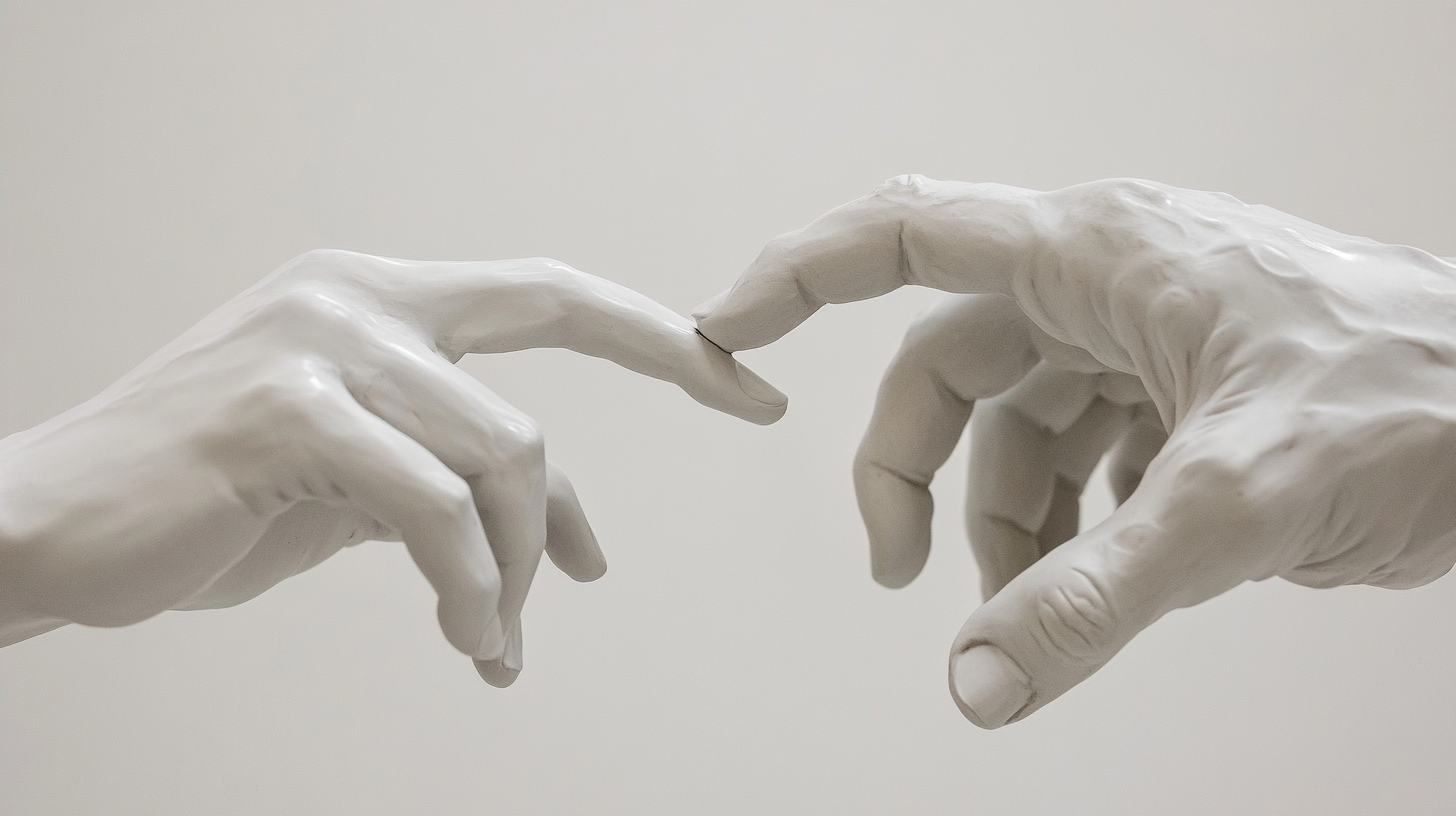 Two Ceramic Hands Trying to Touch