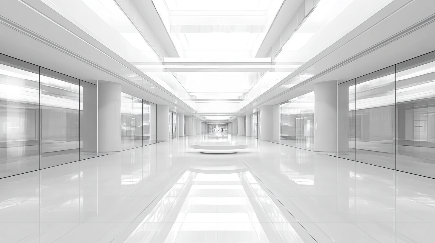 White building with clear bottom lobby and center divide