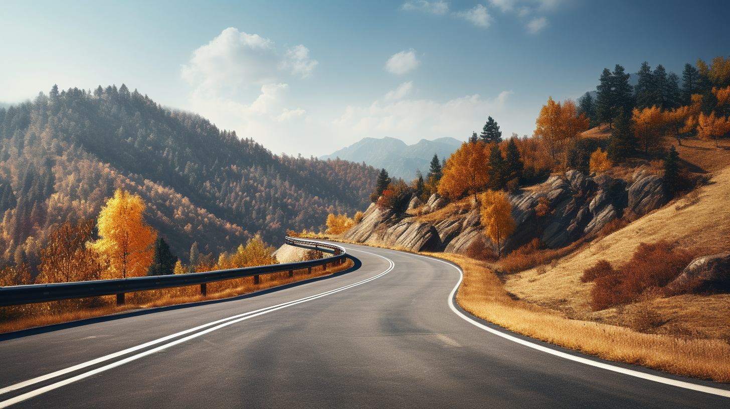 Scenic autumn road with farms and mountains