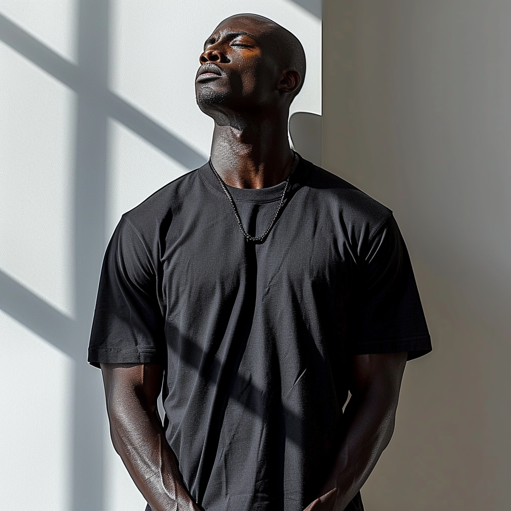 Big muscular male mannequin wearing black t-shirt