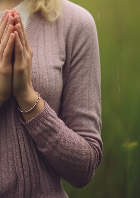 Sad blonde woman praying sincerely ?