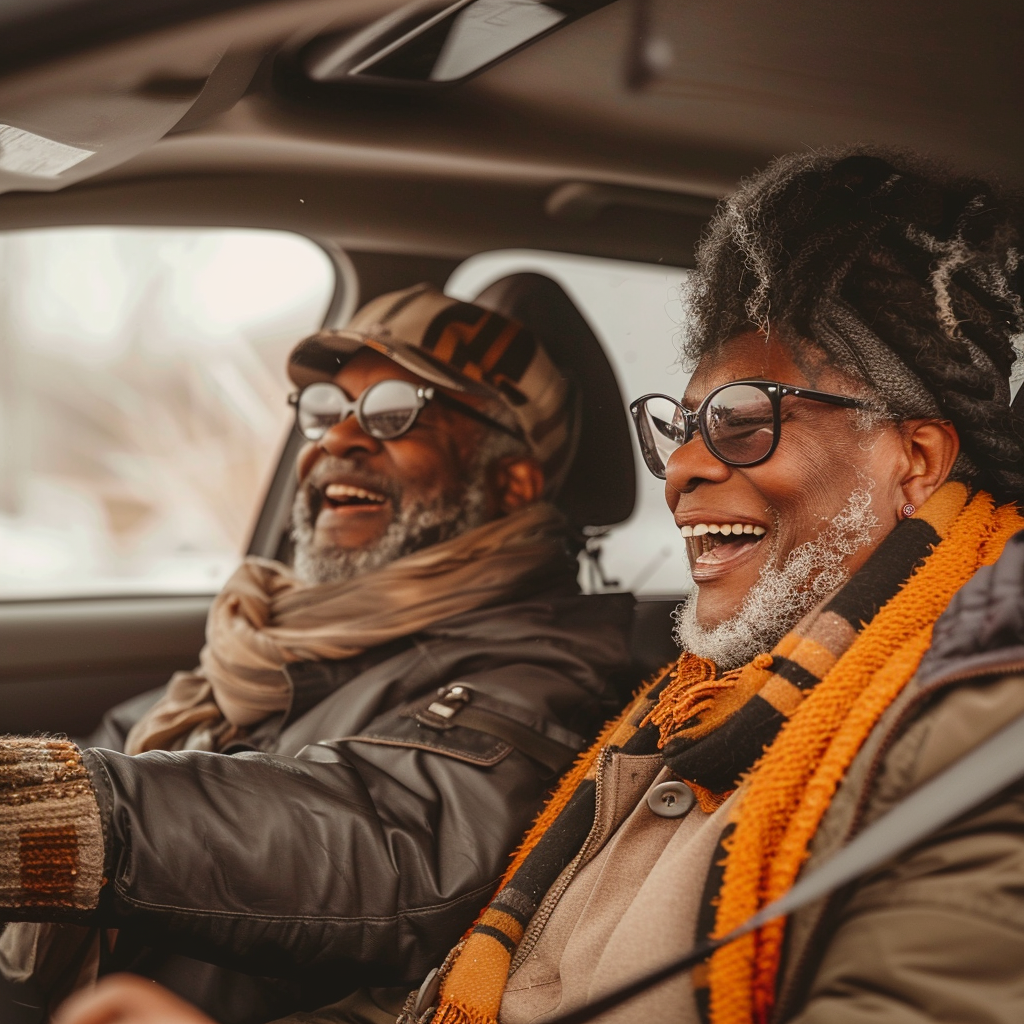 Elderly Black Couple Driving Car