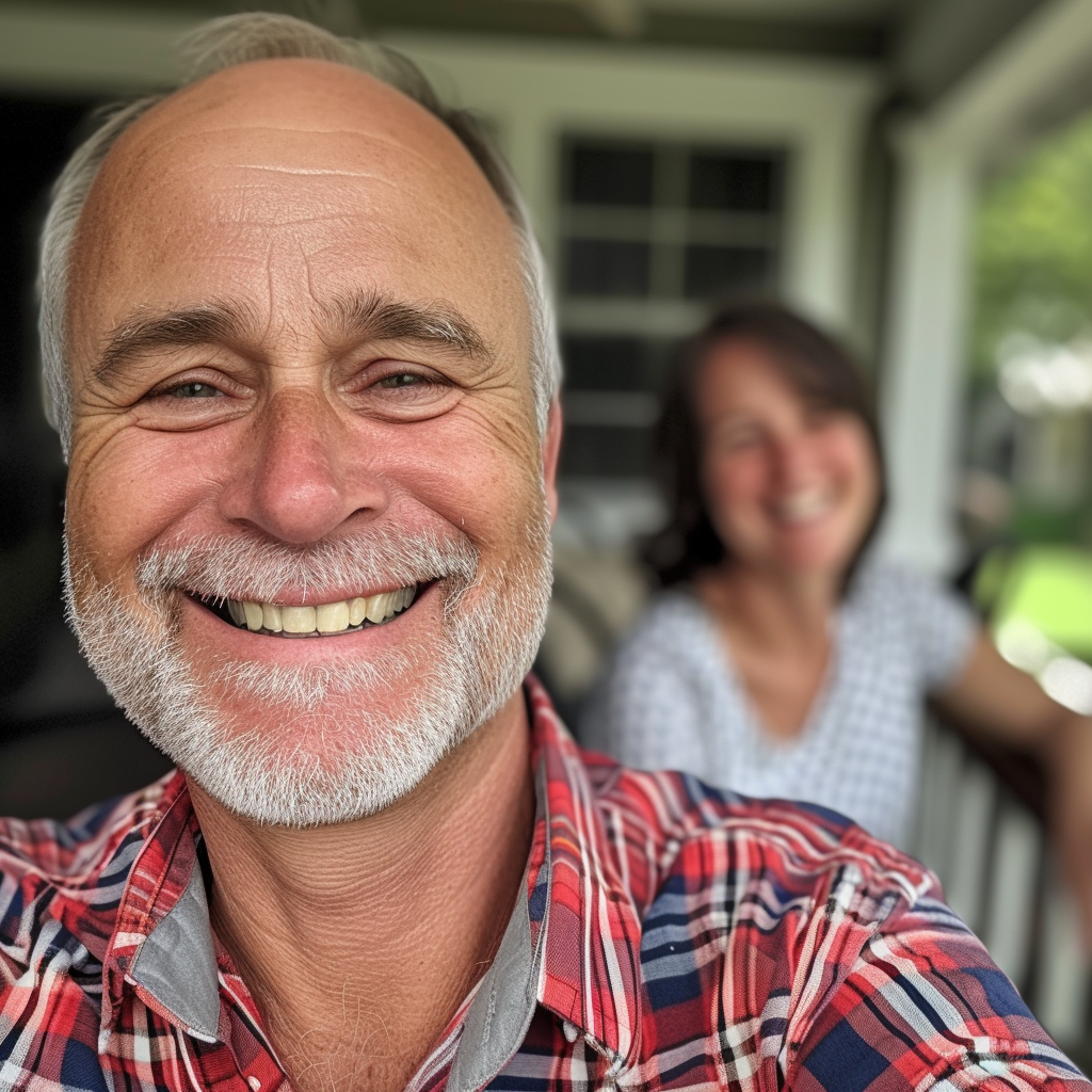 Happy accomplished man with smiling wife