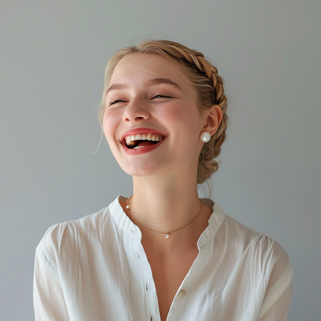 blonde woman with large pearl stud earring