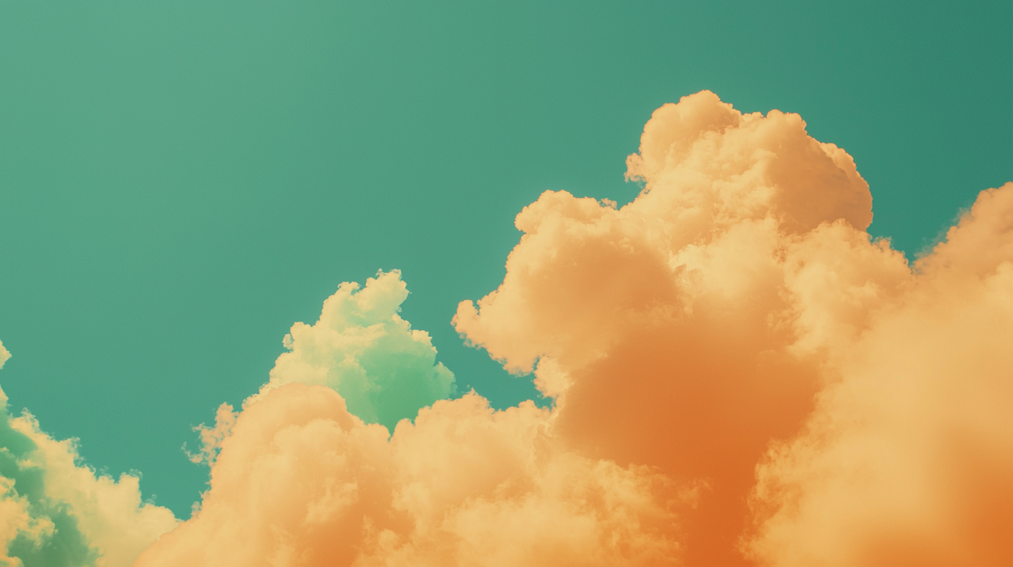 Orange and Green Clouds in Blue Sky